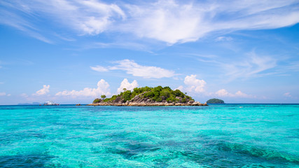 The island is located in the sea The sea is clear and can see the coral. And beautiful sky : Koh Lipe, Satun Province, Thailand