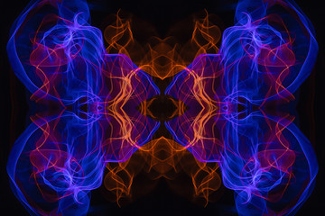 Abstract and symmetrical texture in the form of colorful smoke clouds.