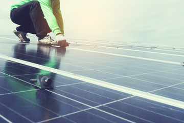 engineer team working on replacement solar panel in solar power plant;engineer and electrician team swapping and install solar panel after solar panel voltage drop