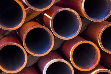 orange sewer pipes, background image close-up
