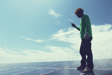 engineer team working on replacement solar panel in solar power plant;engineer and electrician team...