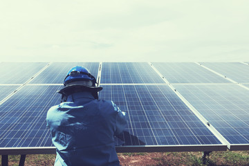 engineer team working on replacement solar panel in solar power plant;engineer and electrician team...