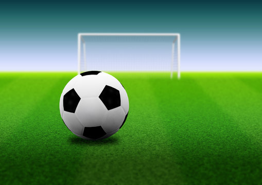 Soccer ball and goal on field
