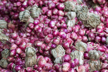 Shallots are called small onions in Thailand and are used as a spice in cooking.