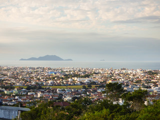 Fototapeta na wymiar Florianopolis, Brazil - Circa May 2018: A view from above of Ingleses neighborhood, popular tourist destination in the summer