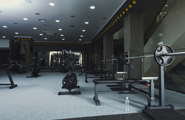 Gym interior with weightlifting equipment