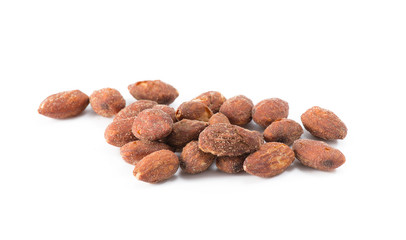 salted and roasted almonds on white background.