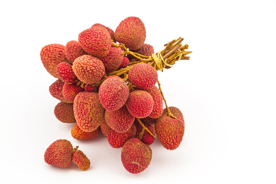 Fresh lychees on white background