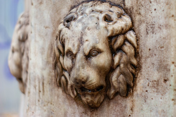 Fototapeta premium Architectural detail of a lion's head on the wall