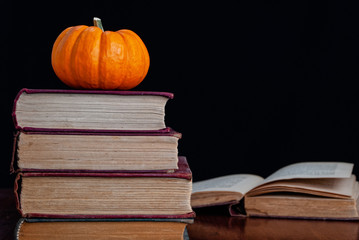 Stacked Books with Pumpkin