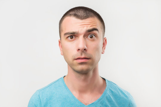 Doubt, mistrust, distrust concept. Doubtful italian man looking with disbelief expression. Hedoes not trust anybody