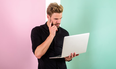 Social media marketing expert. Man with laptop works as smm expert. Smm manager promotes brands and items on internet. Guy stylish modern appearance manager producing content for social networks