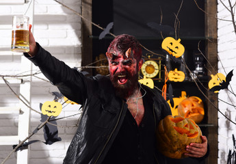Devil or monster partying: halloween party. Man wearing scary makeup © be free