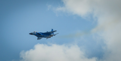 Fototapeta na wymiar Fighter aircraft flying for display