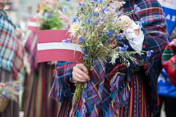 National latvian elements and suits on the openning of National Latvian Song and Dance Festival in...