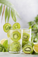 cocktail with kiwi, lemon and mint