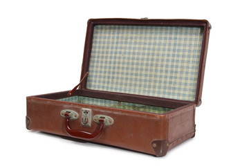 Ancient suitcase for travel on a white background