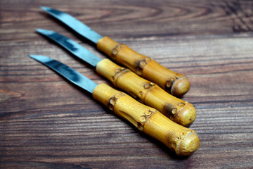 Set of decorative knives with wooden handles