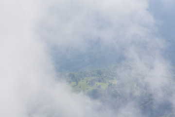 Summer scenery in the mountains, with rain and mist clouds
