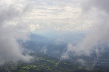 Summer scenery in the mountains, with rain and mist clouds