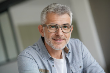 Middle-aged guy with trendy eyeglasses