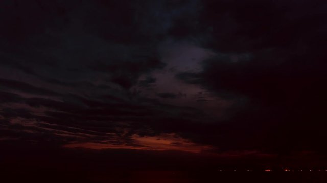 Full hd time lapse of nightfall over sea.