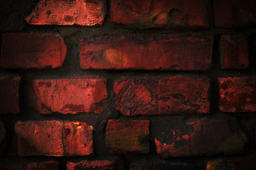 Grungy old dark red brick wall texture. Retro background