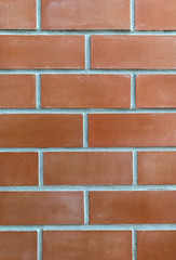 Close up red brick (made look like) wall for background,backdrop,wallpaper concept