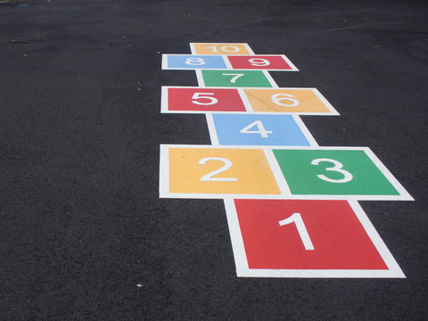 Colorful Hopscotch on Blacktop in a Park