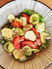 A delicious summer salad with fresh vegetables. Top view