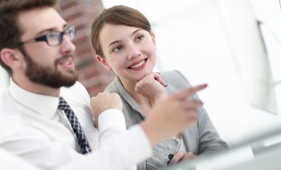 background image of a business team at a Desk.