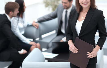 young business woman on blurred background office