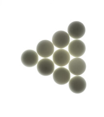 white abstract balls, eggs, geometric shapes, white background