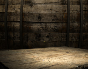 background of barrel and worn old table of wood.