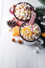 two cups with hot chocolate or cocoa with marshmallow