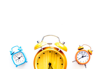 Alarm clock for for waking up on white background top view space for text