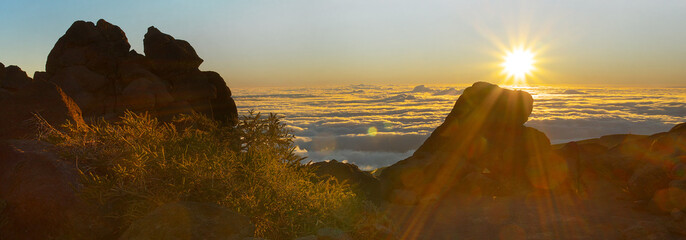 Fototapeta na wymiar Sunrise on Pico de La Cruz, Caldera de Taburiente, Island of La Palma, Canary Islands, Spain