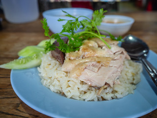 Hainanese chicken rice , Thai gourmet steamed chicken with rice, bean sauce and soup.