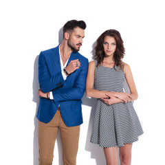 casual man looks seductively at his attractive woman