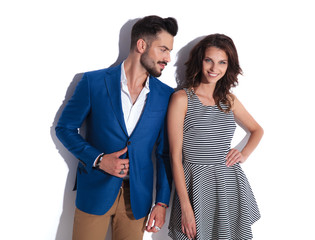 Naklejka premium happy young couple with the man looking at his woman