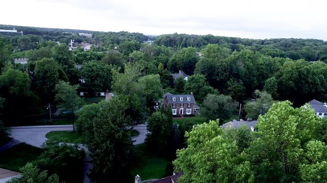 Aerial view of affluent suburban Philadelphia neighborhood in Radnor Township, Villanova, PA during summer time