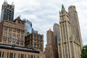 Fototapeta premium New York City / USA - JUN 20 2018: Skyscraper and old buildings in the Financial District of Lower Manhattan in New York City