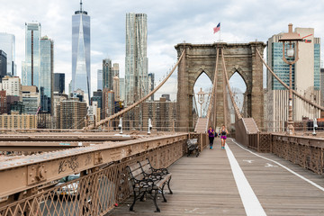 New York City / USA - JUN 20 2018: Brooklyn Bridge with building in Lower Manhattan at early...
