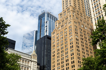 New York City / USA - JUN 20 2018: Skyscraper and old buildings in the Financial District of Lower Manhattan in New York City