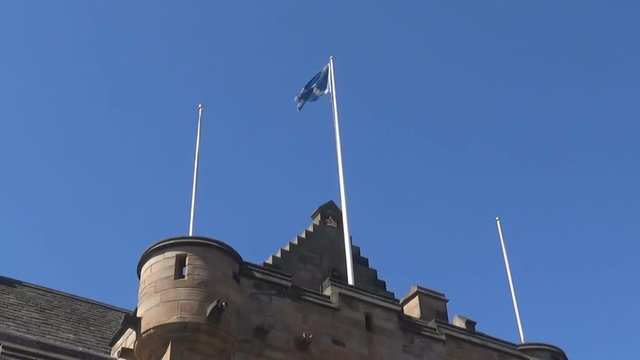 Flag of Scotland on the top of the building
