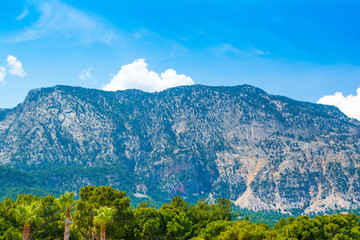 Fototapeta na wymiar Landscape with Taurus Mountains in Turkey witn clouads over the peaks