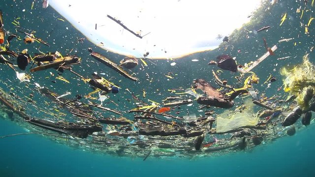 Underwater garbage - trash floating at sea, two footage