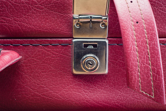 Old vintage suitcase buckle with straps - close up