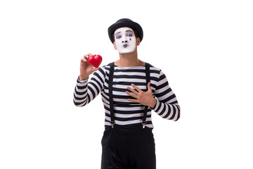 Mime holding red heart isolated on white background 