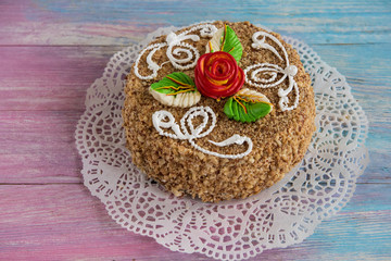 Tasty mini cake on a color gradient background
